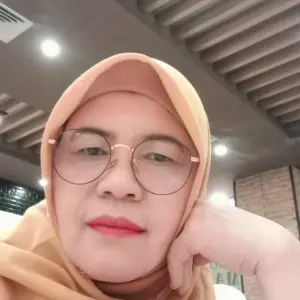Asmawati ,S.Ag