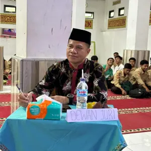 ADRINALDI S.Pd.I
